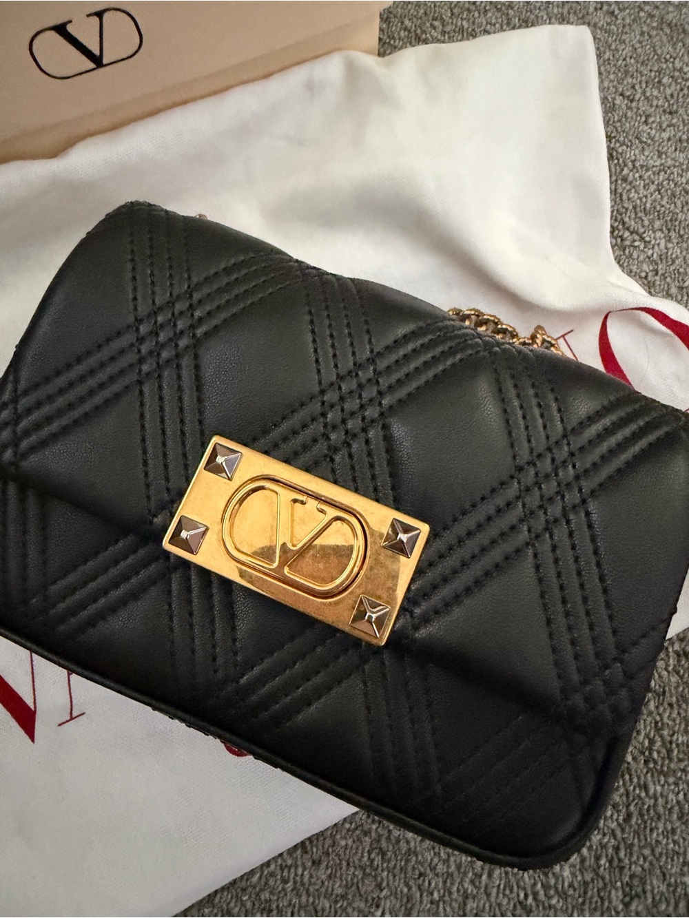 Valentino Garavani Black Quilted Mini Shoulder Bag with Gold Logo Plate